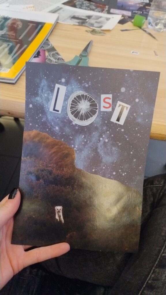 Izdelek udeleženke. Prikazuje abstraktne motive in vesolje ter majhno kuno ter napis "LOST"